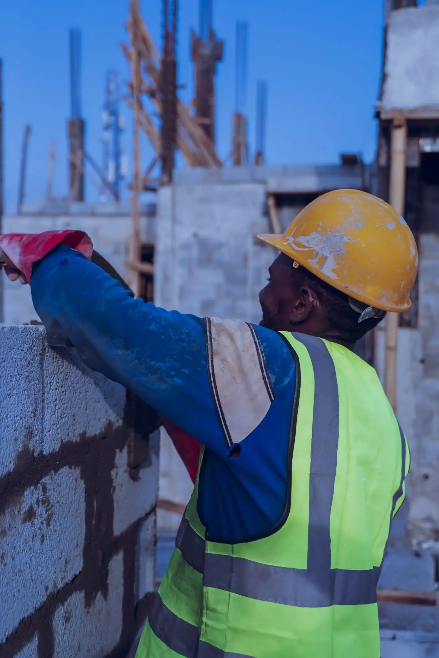 A bricklayer at work on a building site